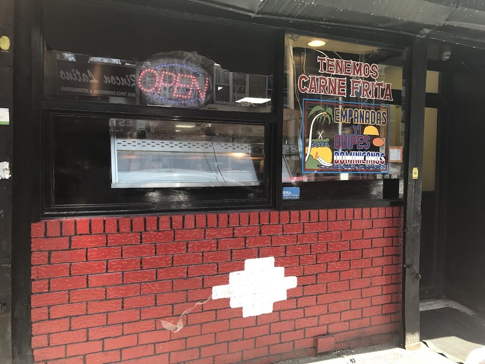 Front view of a Dominican restaurant.